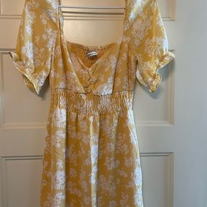 Yellow floral babydoll dress, never worn